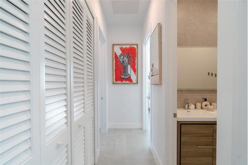 Hallway to bedrooms and laundry room.