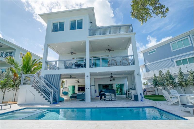 Gorgeous pool deck, outdoor kitchen, and so much more.