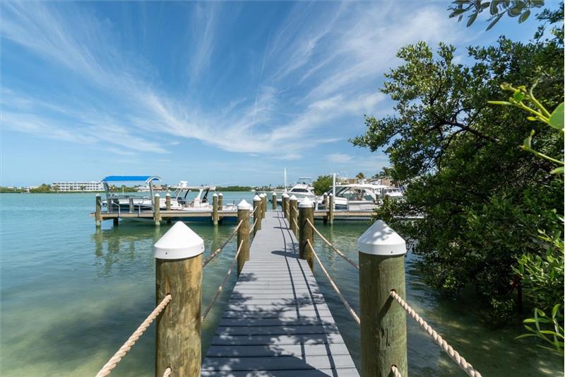 Walkway leading to 35` dock and fish-cleaning station.