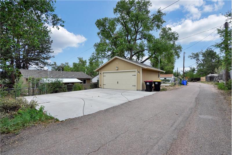 Detached 2-Car Garage with Long Driveway for Extra Parking