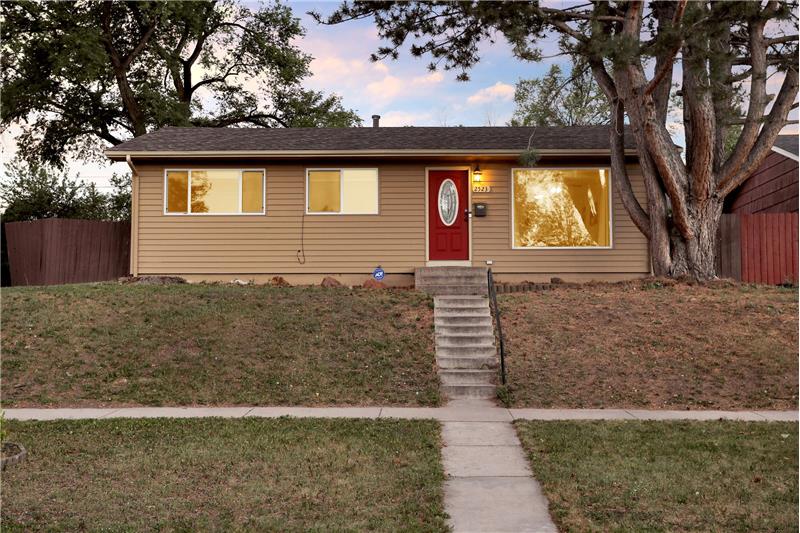 Sunset Views of the Front of the House with Stairs to the Front Door