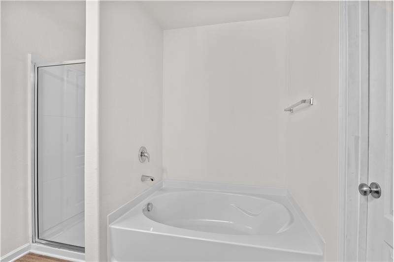 Soaking tub in primary bathroom