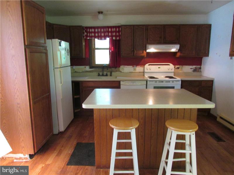 Eat-in kitchen with Corian Countertops