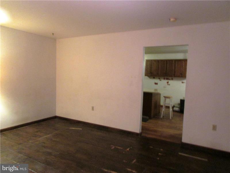 Living room going into the kitchen