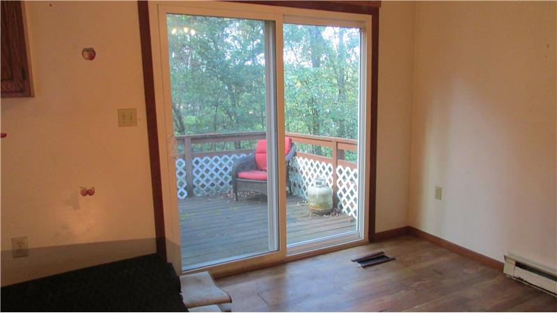 Sliders off the dining area to the multi-level decks 