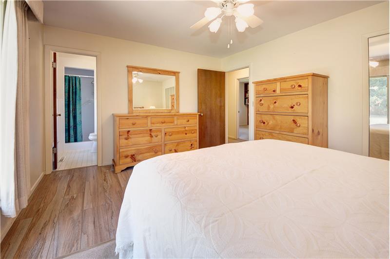 Main Level Master Bedroom with Attached Three Quarter Shower Bathroom