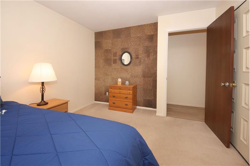 Main Level Bedroom #3 has Neutral Carpet