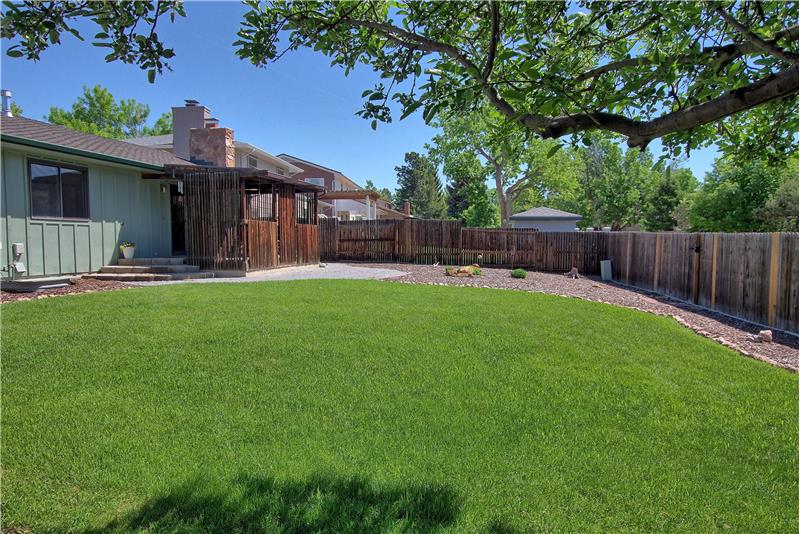 Beautiful, 0.21 Fenced Acre Lot