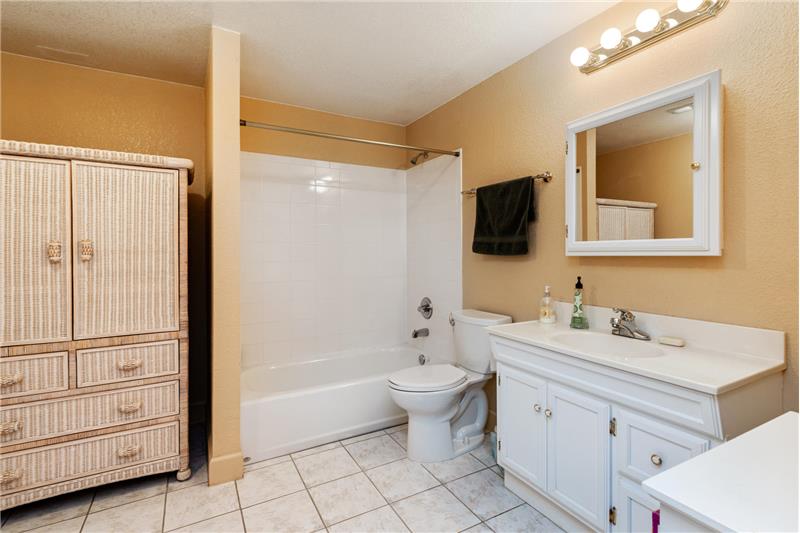 Basement bathroom. Armoire at left is for sale outside of closing.