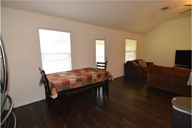 Dining area is open to the family room and kitchen.