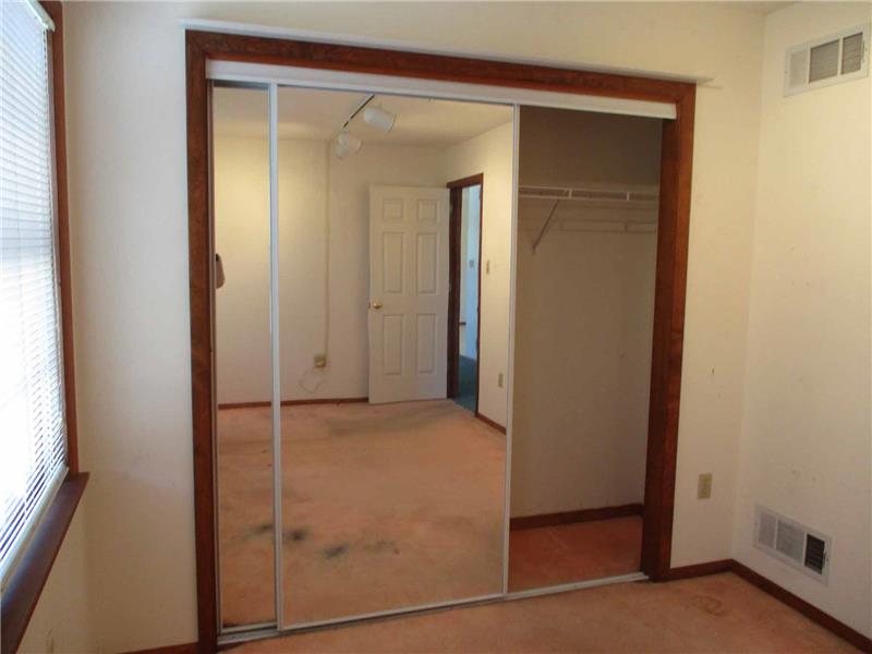 Bedroom with large closet