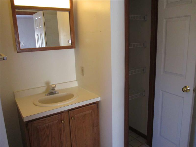 Full bath with linen closet