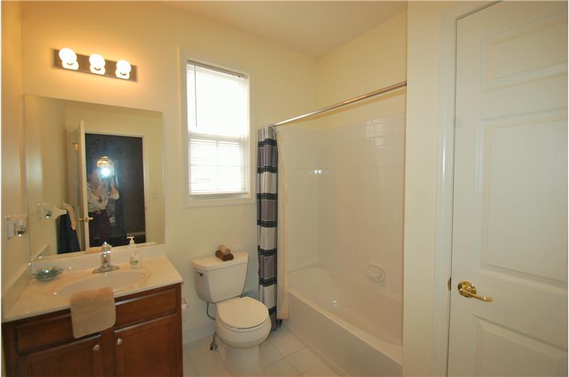 MAIN BATH WITH BUILT-IN LINEN CLOSET