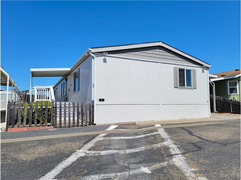 That additional square footage means front bedrooms & closets are Much Larger, and the Lot is the Largest Offered in the Park!!!