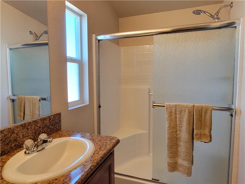 Shower Enclosure features TWO SEATS!
