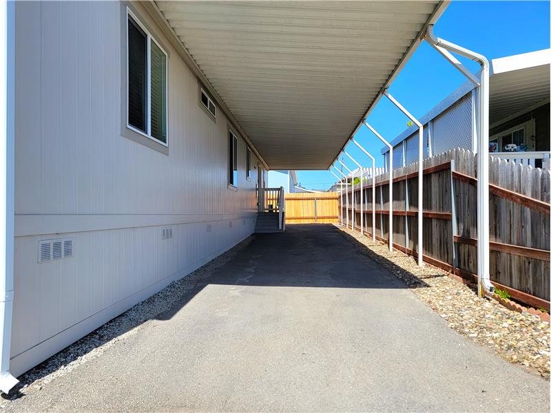 3 Car Tandem Covered Parking!!  Plus rooms for toys!