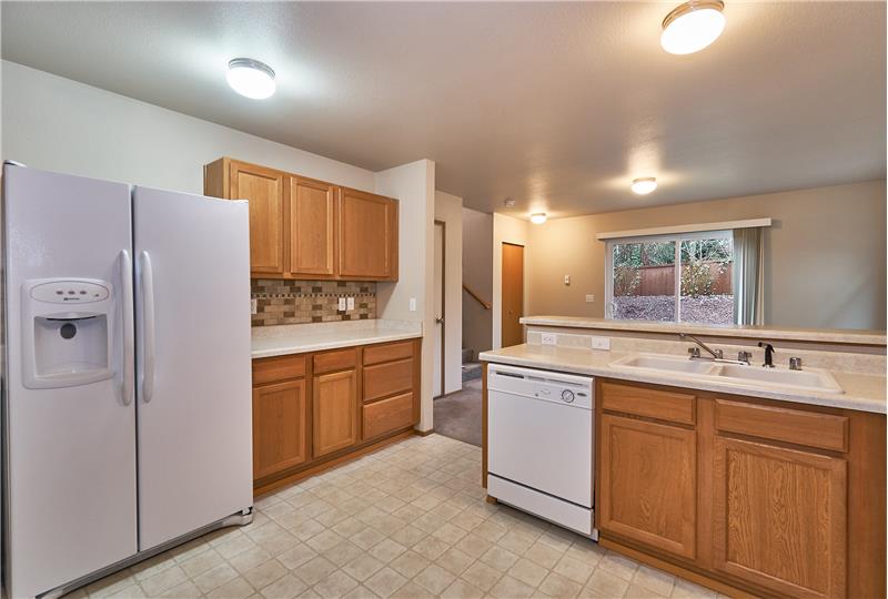 Light and Bright Kitchen. Refrigerator is included.