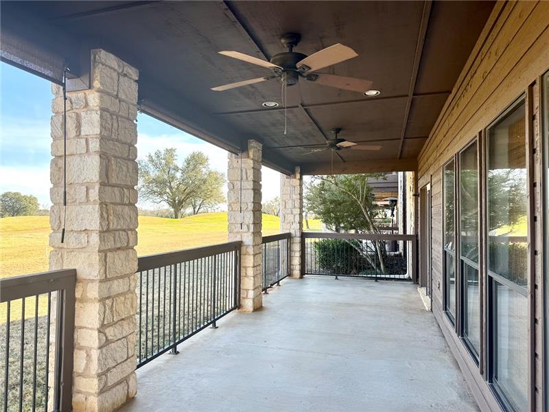 HUGE covered back patio with ceiling fans