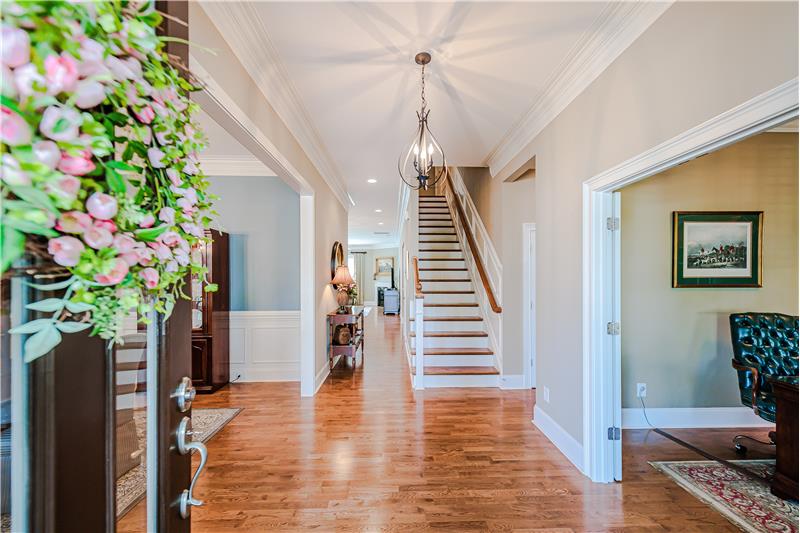 Gracious, wide foyer is a beautiful introduction to the home.