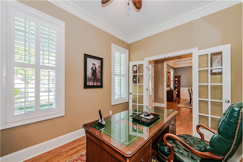 French doors provide an extra element of privacy to the study.