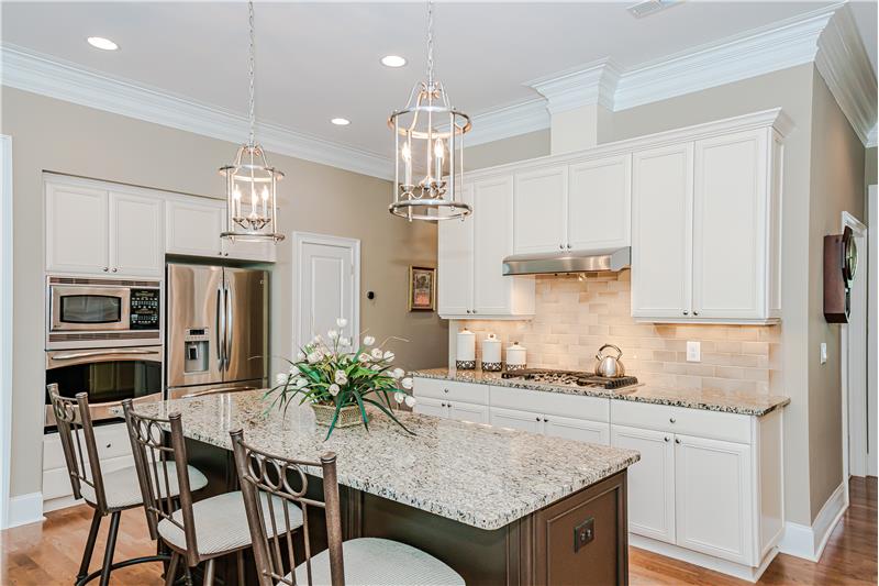 Set the mood you want with the kitchen's recessed lighting, designer pendant lighting, under-cabinet lighting.