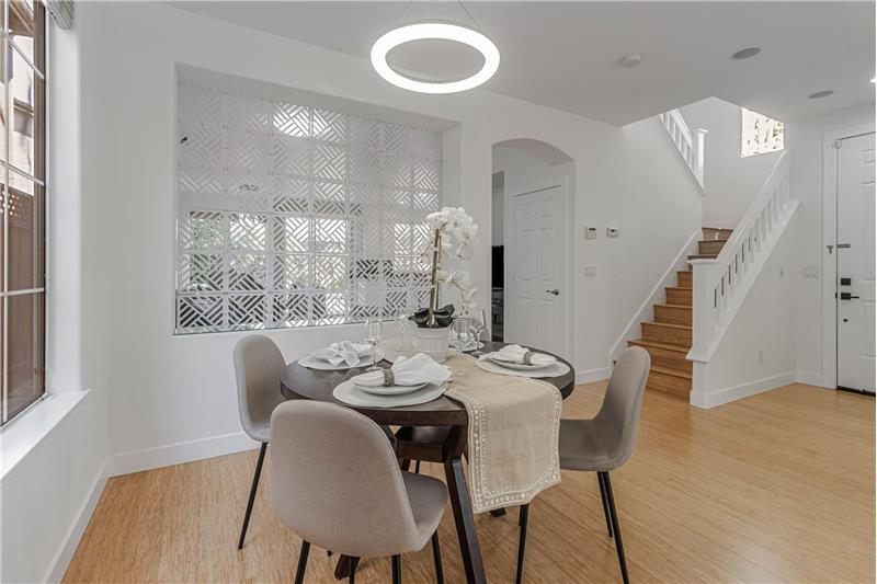 Gleaming Light Fixtures & Natural Light in Dining Area!