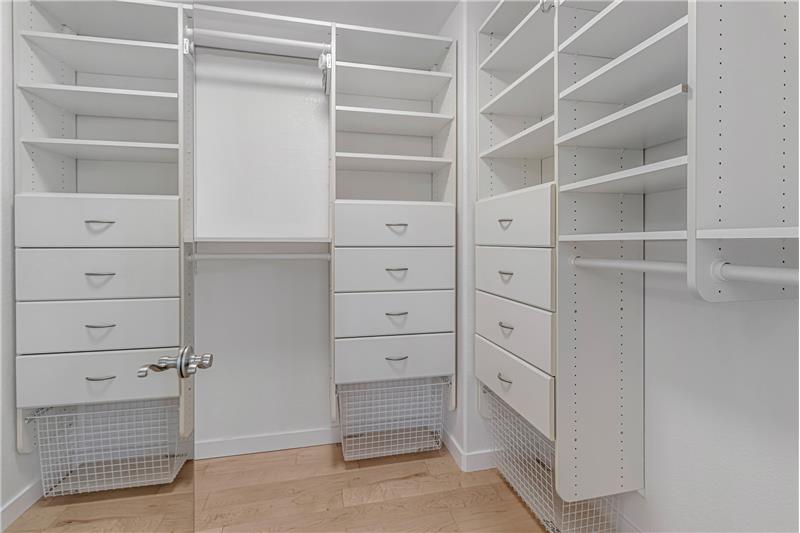 Huge Walk-in Closet with Abundant Organizers & Storage Space!