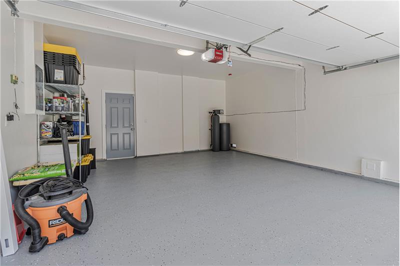 Newly Fully Finished Garage with Gleaming Epoxy Floor!