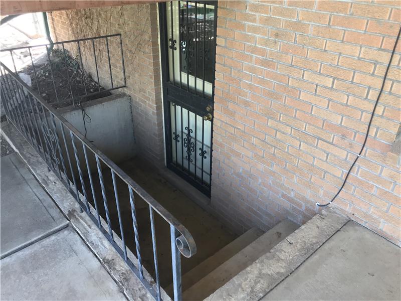 The patio is 3 steps up from the walk-out basement.