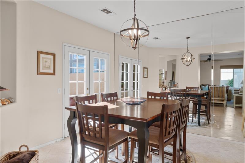 Dining Area With double doors to patio