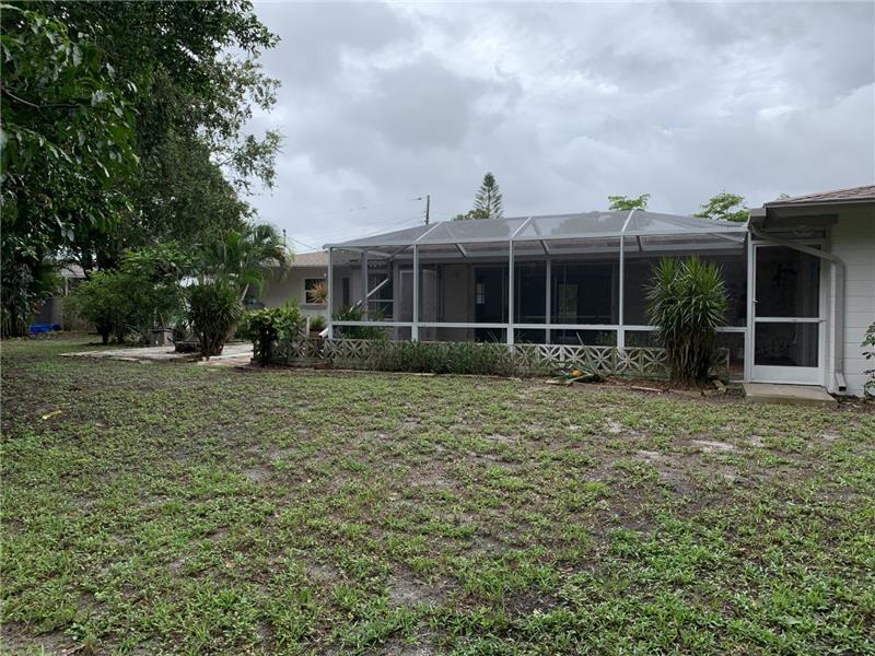 Backyard facing house