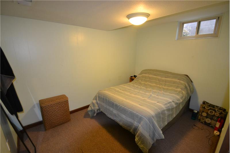 Basement bedroom is non-conforming. No egress window & closet is outside the room