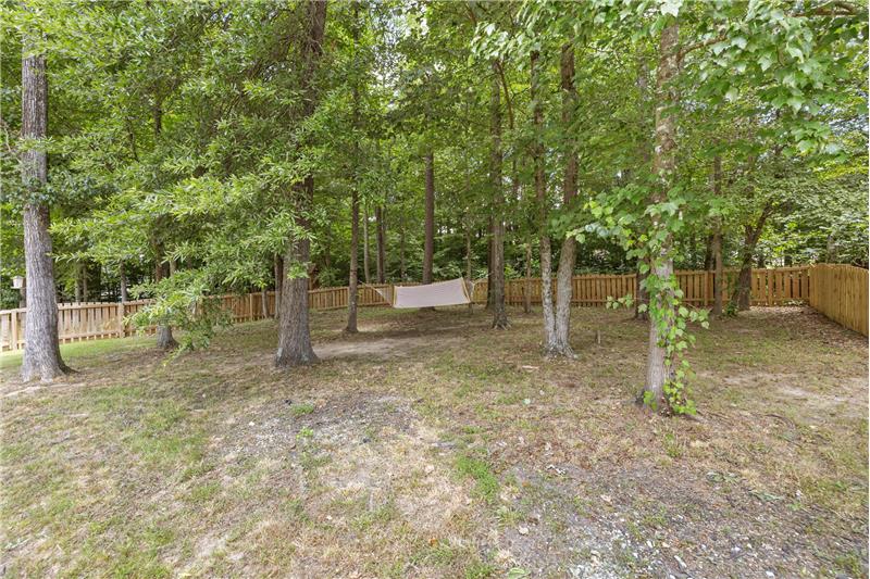Unwind and relax in your own hammock under the shade of mature trees