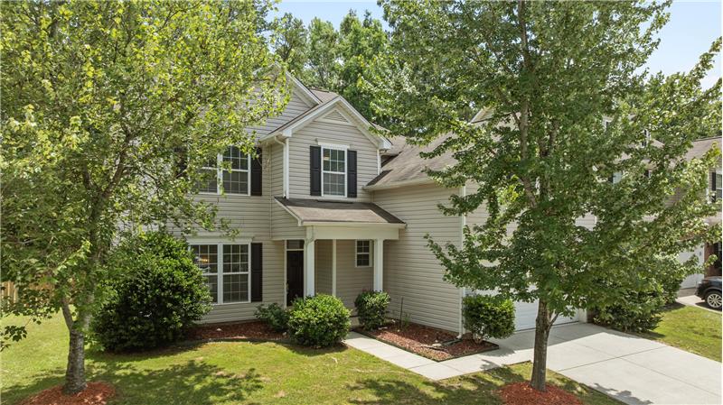 You’ll love coming home to this peaceful retreat, surrounded by the natural beauty of mature trees and a serene outdoor setting