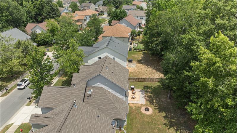Aerial view of home's back yard
