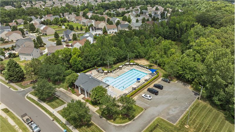 Additional community amenities include tennis and pickleball courts, club house, soccer field, walking trails