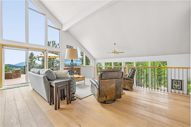 Great room on main level - water feature visible over railing