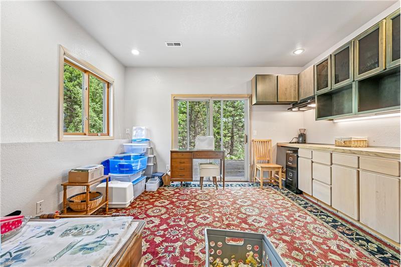 Lower level bedroom with door to lower deck