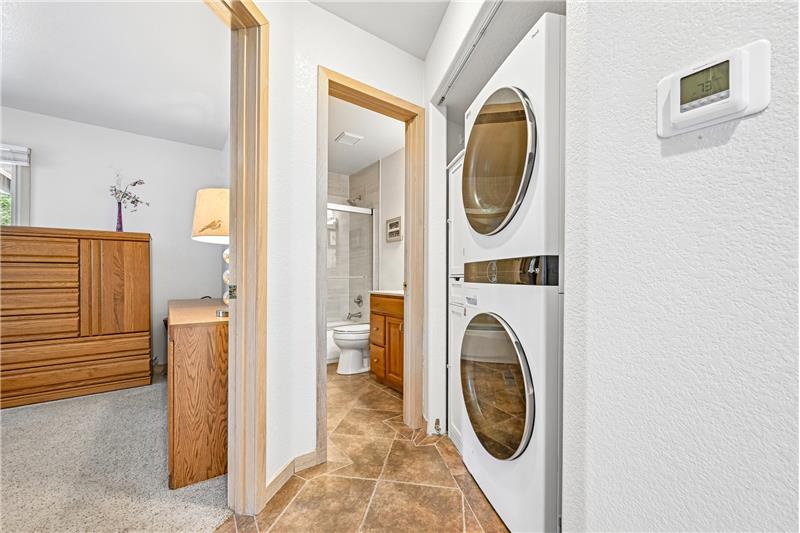Main-floor laundry, with full bath beyond