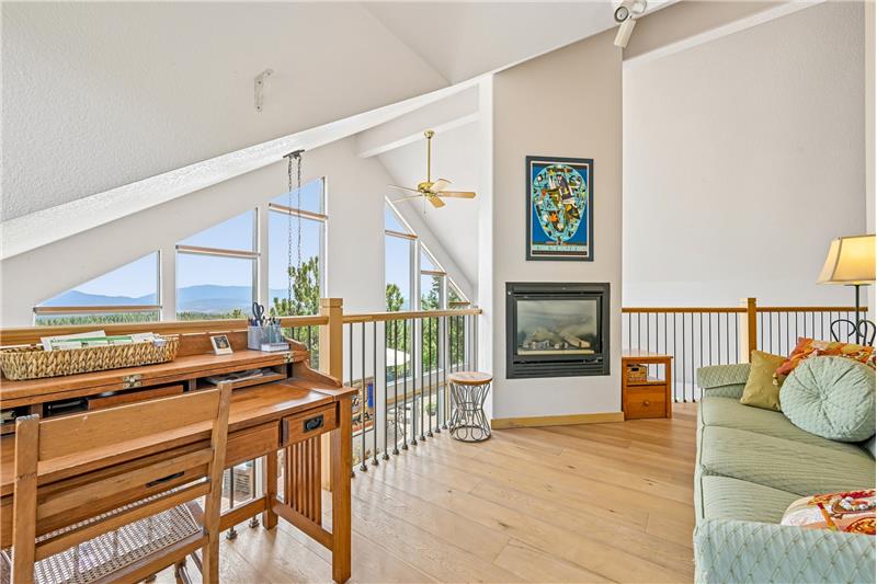Loft with one of 3 fireplaces