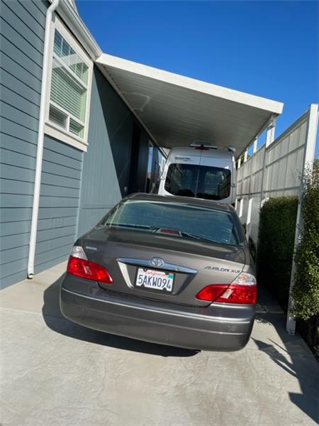 Carport is approximately 10'3