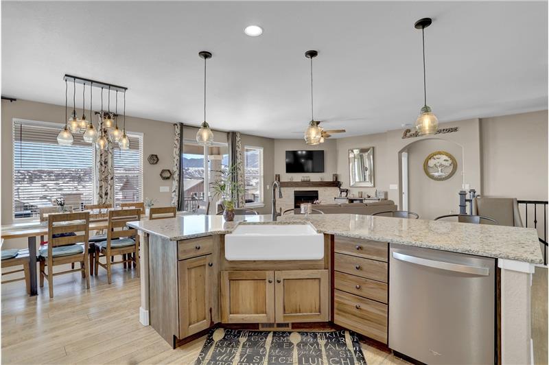 Light and bright open floor plan with upgraded pendant lights