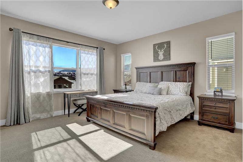 Primary Bedroom provides a walk-out to the deck