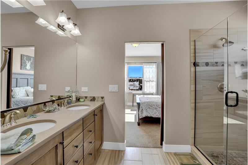 View of the Primary Bedroom from the Primary Bathroom