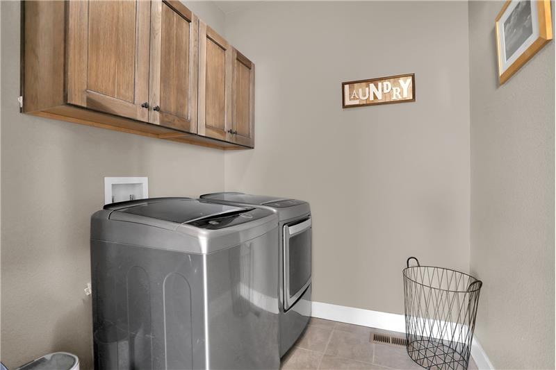 Main level laundry room with washer and dryer