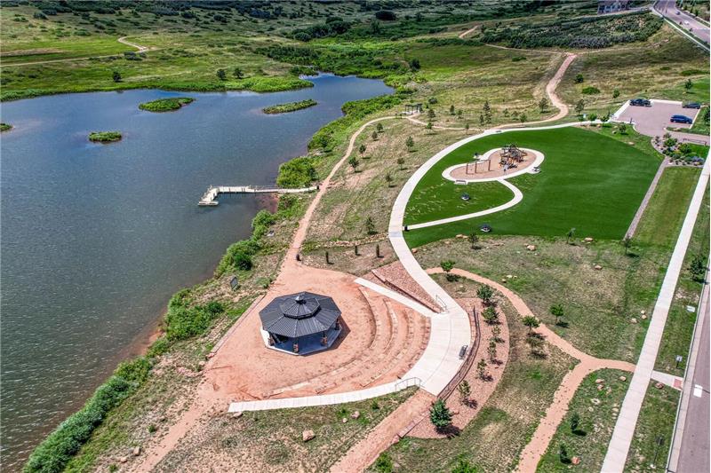 Aerial view of the playground, dock, and lake