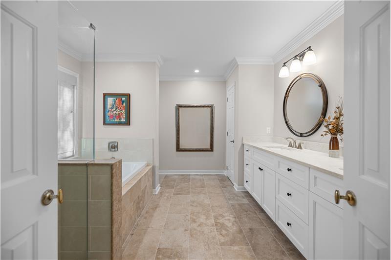 En-suite primary bathroom remodeled in 2020