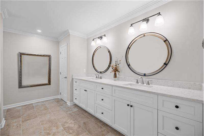 Extended double-sink vanity with quartz counter, designer mirrors