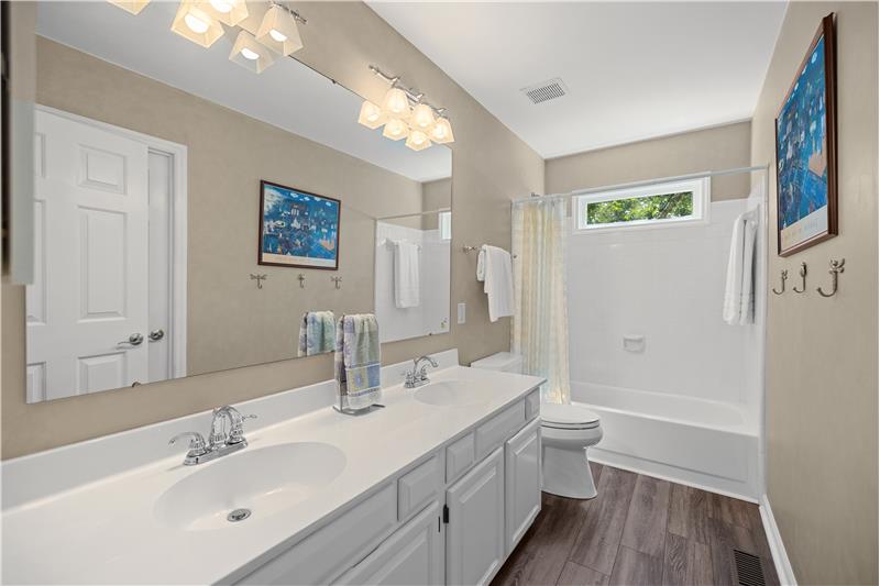 Full bathroom on second floor with double sink vanity