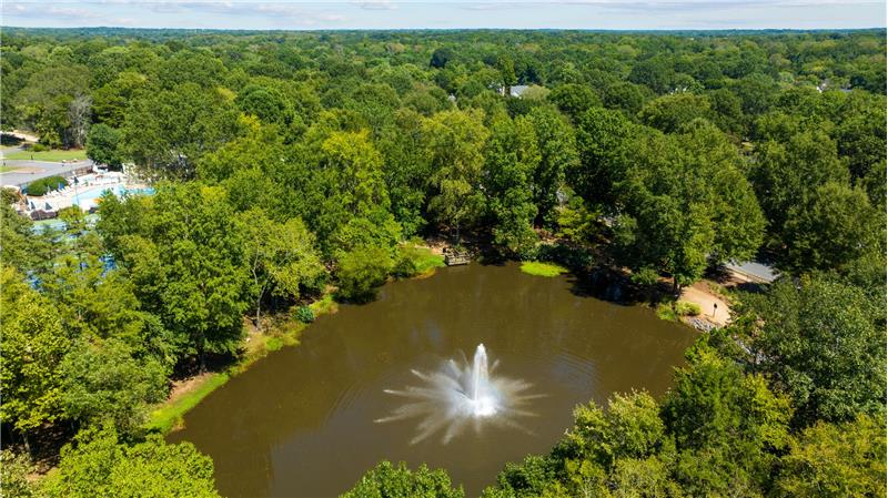 Natural spring-fed pond with walking trail